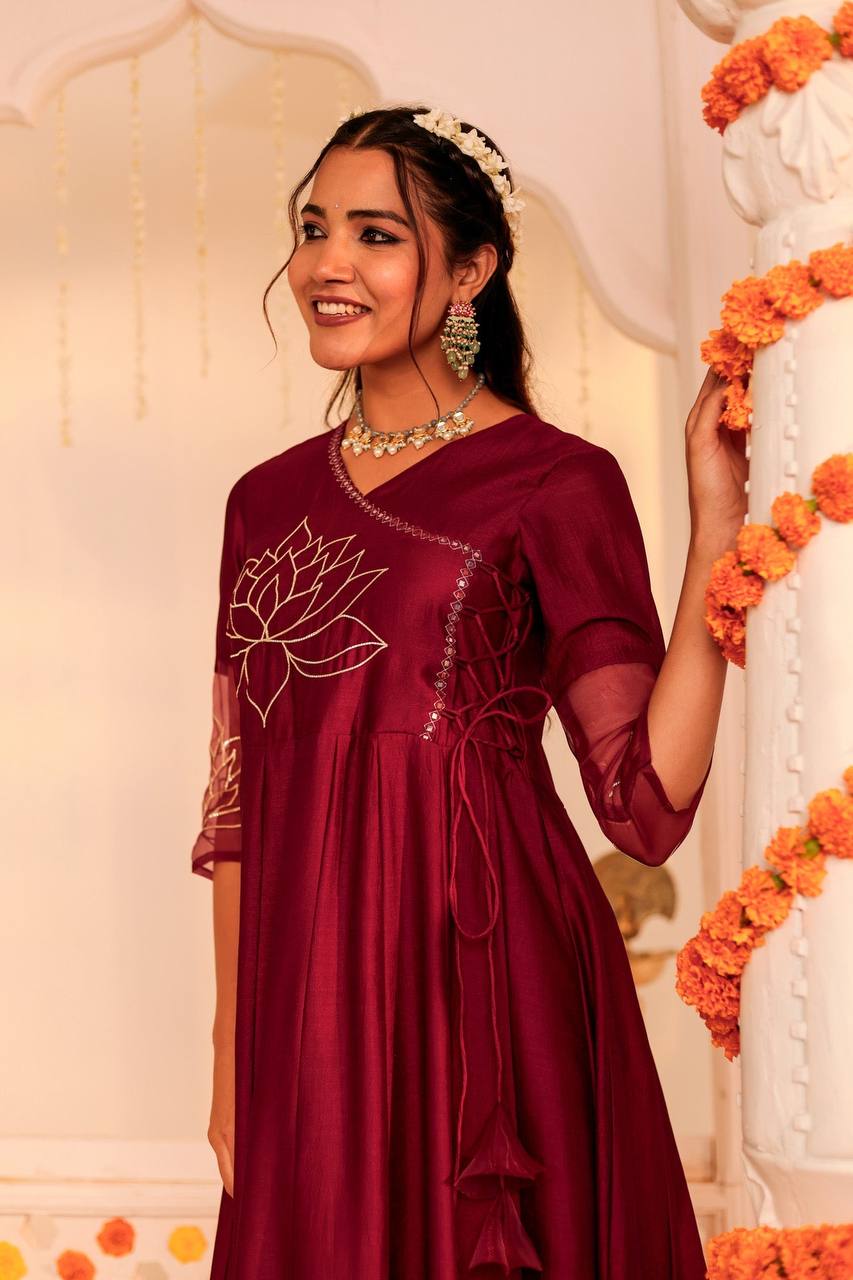 Alishka Maroon Muslin Silk Kurti: Timeless Lotus Elegance Lotus Embroidered Muslin Silk Kurti: Grace Redefined