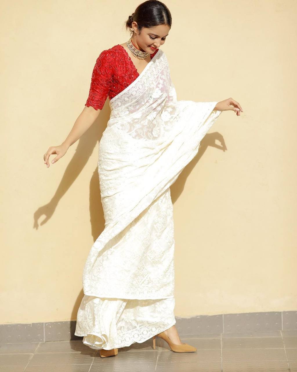 "Stunning Georgette Saree with All-Over Sequin Chain-Stitch and Stone Embellished Blouse"