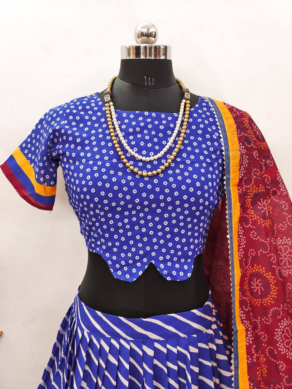 "Exquisite Gujarati Navratri Lehenga Set with Lehariya Dupatta & Traditional Print Detailing"